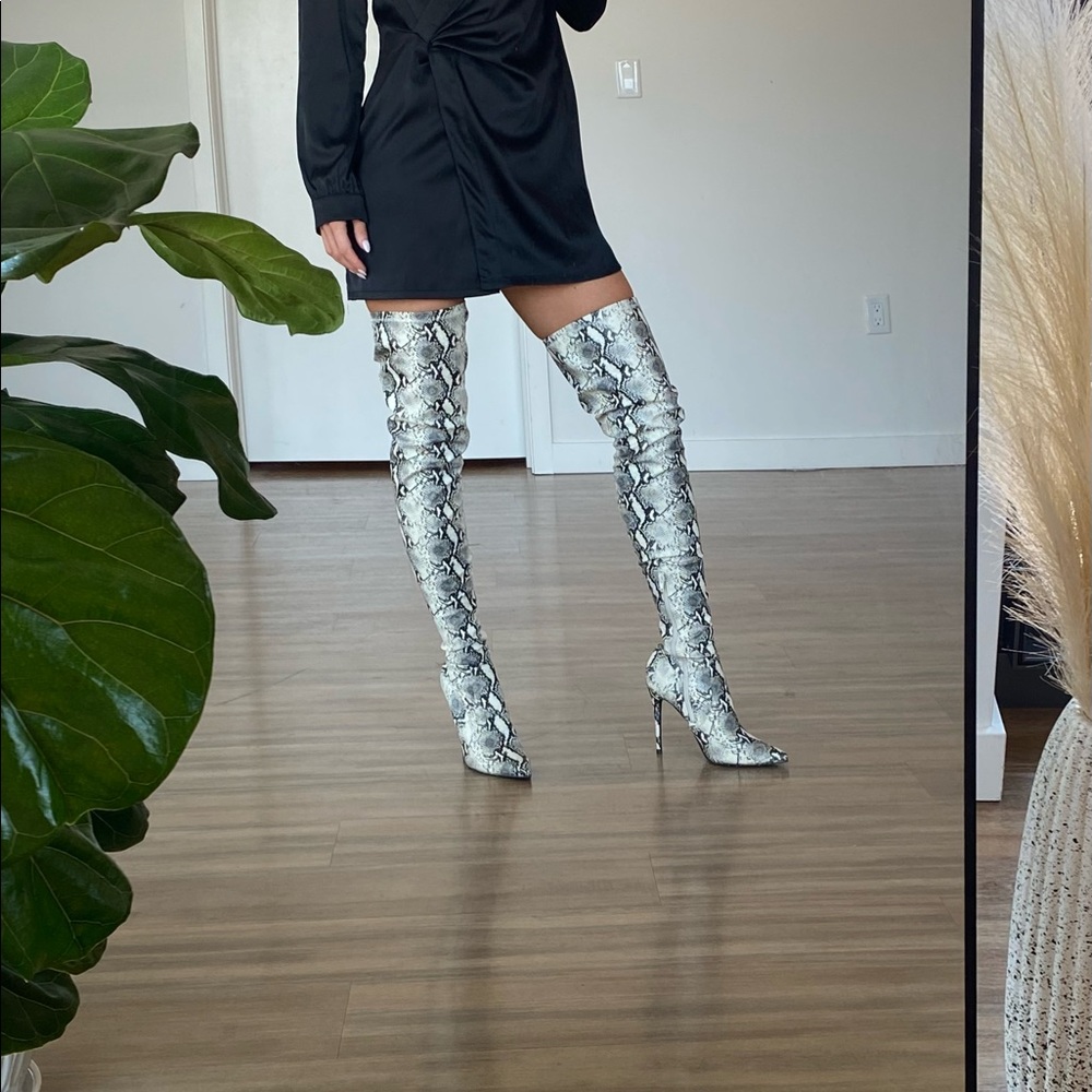 Steve Madden Thigh-high Snakeskin Boots.